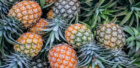 Why consuming pineapple during periods would be highly beneficial for women?